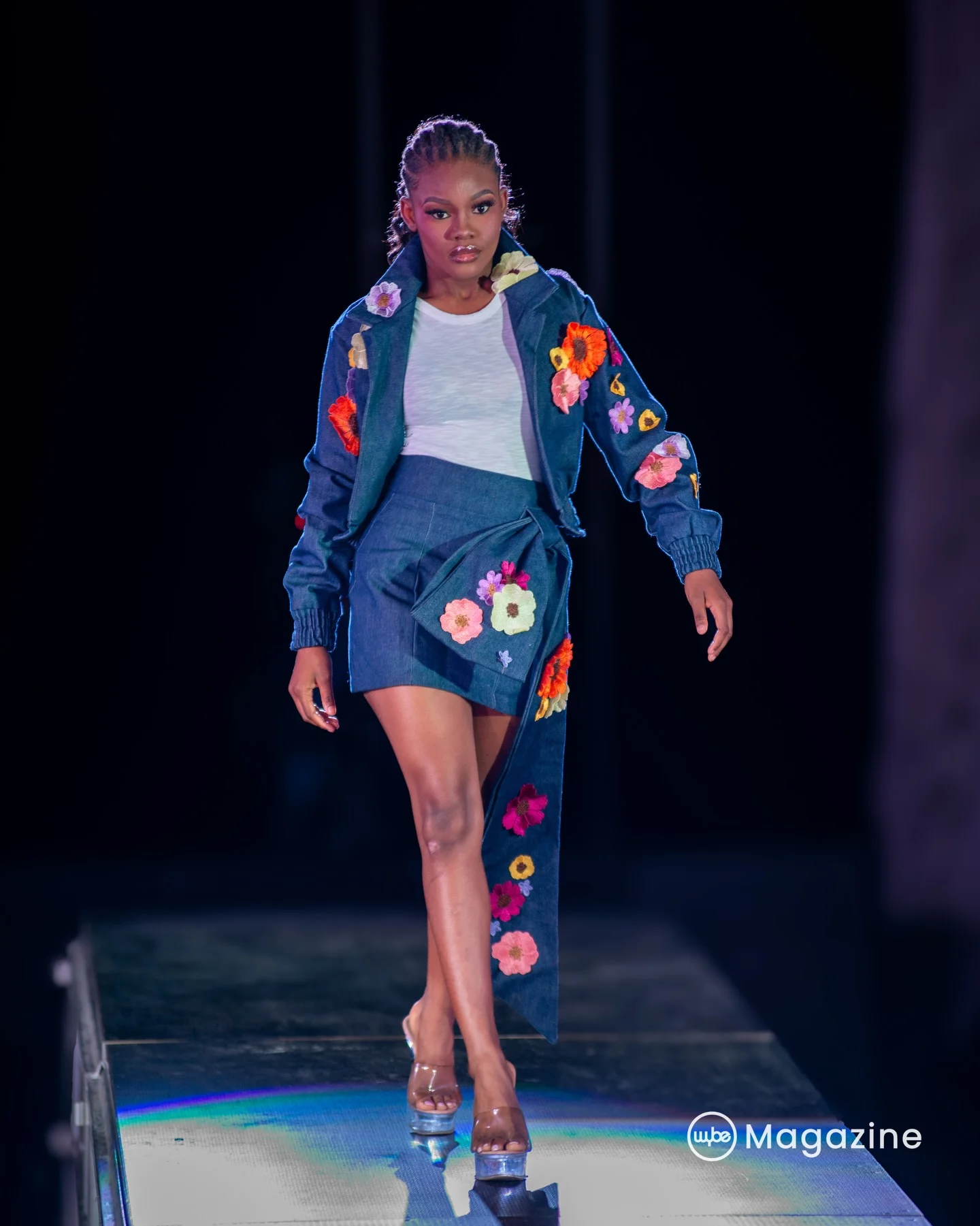Denim jacket & skirt: Cropped denim set scattered with embroidered flowers, finished with a draped side panel.